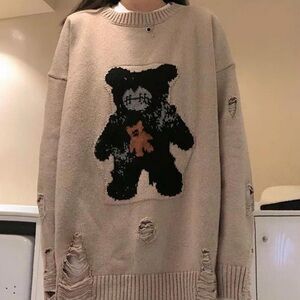 knitted distressed sweater with bear pattern